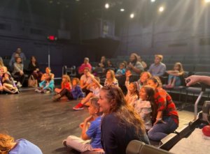 Families participate in dual language drama presentation