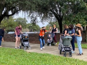 Teaching Artist performs for babies in strollers.